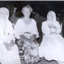Margaret Nyssen (center) Project HOPE OR nurse.