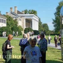 Alumni boarding the bus in front of Carter Hall at the 2008 reunion in DC.