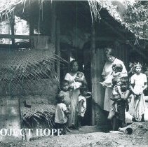 Judy Golbuff Tomkins visits a home in Colombo, Ceylon.