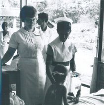 Barbara Miller with counterpart at a clinic in Ceylon.