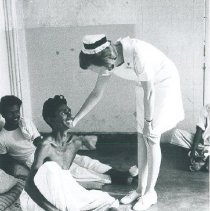 Barbara Farley with patient at Kandy General Hospital in Ceylon.