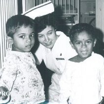 Rosemary Zink with Pediatrice patients on the SS HOPE in Ceylon.