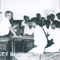 Fred Miller with dental students at Kandy General Hospital in Ceylon.
