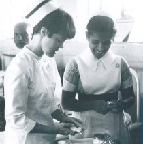 Grace Tucker and counterpart preparing med tray at Kandy General Hospital.