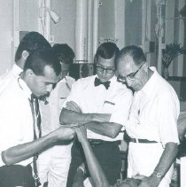 Unknown doctors with counterparts on the SS HOPE in Ceylon.