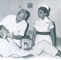 William McCafferty with Ceylonese nurse and patienton the SS HOPE in Ceylon