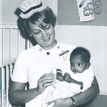 Susan Papegaay with Pediatric patient on the SS HOPE in Ceylon.