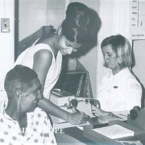 Volunteer Melanie Seneviratne and Admission Secretary Niall O'Melia Ceylon.