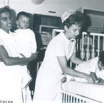 Nancy Fern and counterpart on the SS HOPE in Ceylon.