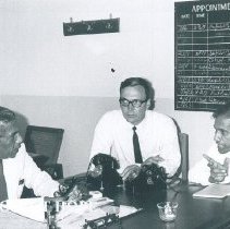 l-r AKM Perera, James Howell and HC Uragoda on the SS HOPE in Ceylon.