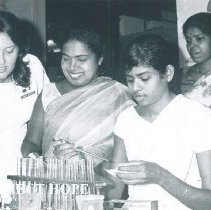 Karen Beadles with counterparts in the laboratory in Colombo General Hosp.
