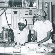 Jeanette Dillman and counterpart on the SS HOPE in Ceylon.