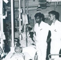 Hugh Tatlock with medical students on the SS HOPE in Ceylon.