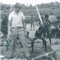 Unknown with students on cleanup day at Maradana School in Ceylon.