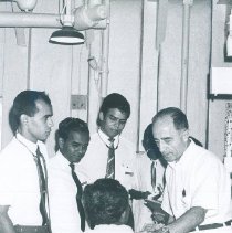 Abid Karam wth counterparts and Patient on the SS HOPE in Ceylon.