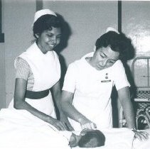 Judy Berner with counterpart in Colombo General Hospital in Ceylon.