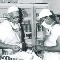 Henry Bodner with counterpart on the SS HOPE in Ceylon.