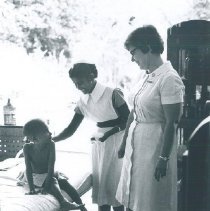 Barbara Miller with patient in Kandy General Hospital in Ceylon.