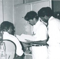 Robert Eberle in ENT clinic on the SS HOPE in Ceylon.