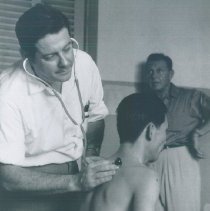 William B Walsh with patient and Ralph Bellamy on SS HOPE in Vietnam.