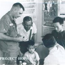 George Brockman in a hamlet with US Army Sargeant in South Vietnam 1960.