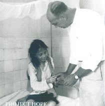 HOPE Gene Schulze with patient at Bien Hoa Mental Hosp in Vietnam 1960