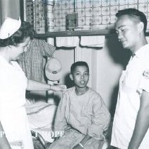 Chief nurse Claire O'Neill on SS HOPE in Indonesia 1960.