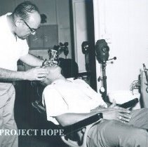 Dr Tischer in the dental clinic on the SS HOPE in Indonesia 1960