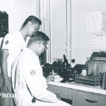 Robert Toth, Medical Technologist with counterpart on SS HOPE in Indonesia