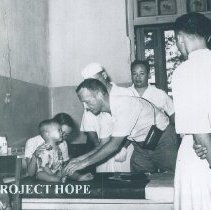 Unknown Doctor in a clinic in Saigon while the SS HOPE was in Vietnam 1960