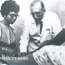 Sam Kron with counterpart on the SSHOPE in Guayaquil,Ecuador 1963.