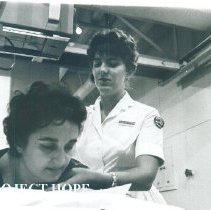 Caroline Strong x-rays a patienr on the SS HOPE in Quayaquil, Ecuador 1963.