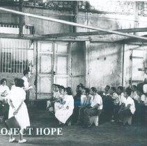 Patients register at a HOPE clinic in Ecuador 1963.