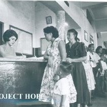 Pat Paez registers a patient at a HOPE clinic in Quayaquil, Ecuador 1963.