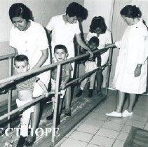Alice James with patients and counterparts on the SS HOPE in Guayaquil Ecua