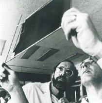 Dr Robert Kettrick examines x-ray with counterpart in Poland.