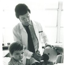Dr Terry King with patient in Poland.