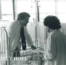 Dr Terry King with counterpart at Institute of Pediatrics in Poland.