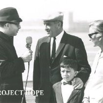 CBS  news anchor interviewing a HOPE couple with their son
