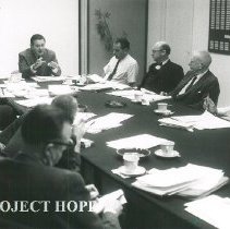 William B Walsh in a curriculum planning meeting