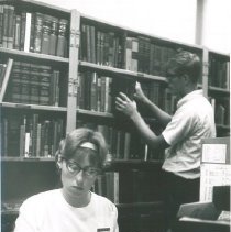 HOPE nurse ? and Richard Templeton in the SS HOPE library in Nicaragua