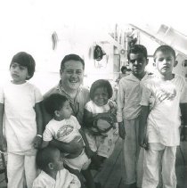 William B Walsh with pediatric patients on the deck of SSHOPE in Nicaragua.