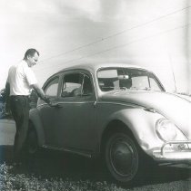 Sam Kron picks up Dr Rivas in his car as they begin their day.