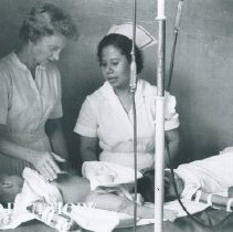 HOPE nurse with counterpart  while SSHOPE was in Peru in 1962.