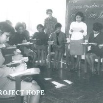 HOPE nurse unknown with students in Peru in 1962.