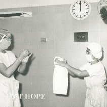 HOPE OR nurse Peggy Brenan with counterpart on SSHOPE in Peru 1962.