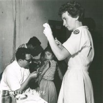 HOPE nurse unknown and counterpart immunizing patients in Peru 1962.
