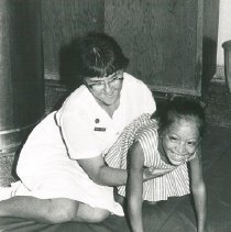 Carol Levin with physical therapy patient on SS HOPE in Colombia 1967.