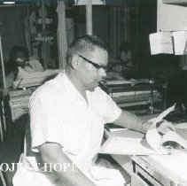 Physician Gerhard Tank seeing patients on the SS HOPE in Colombia 1967.