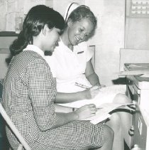 HOPE nurse Rita Ailinger with another HOPE nurse on SS HOPE in Colombia